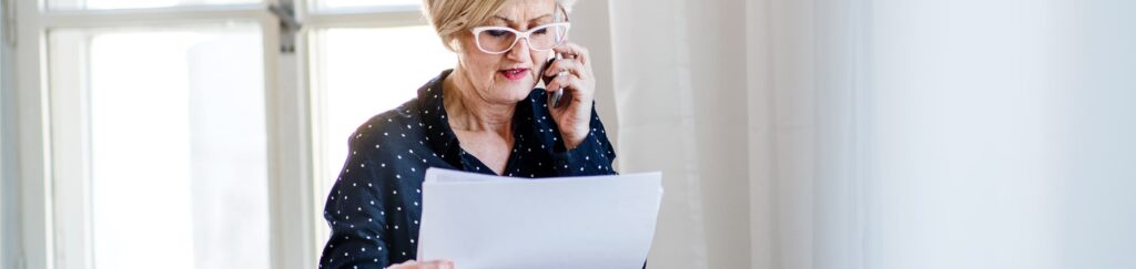a women check the checklist what to do when parent dies