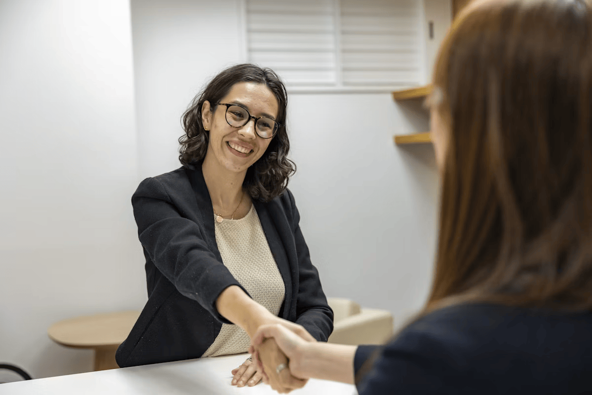 Financial advisor shaking hands with a client